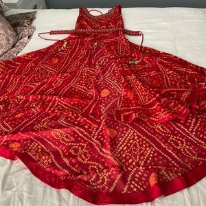 Red kurta and palazzo pants with belt and dupatta (bandhani pattern)